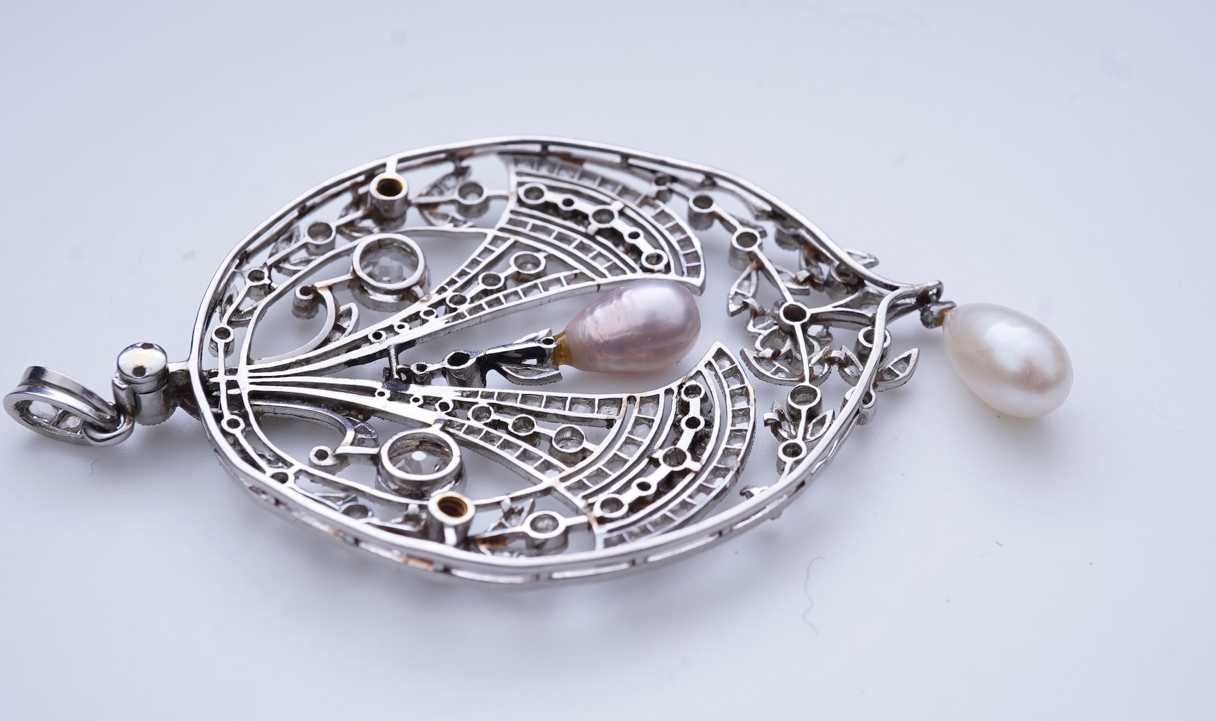 A fine Belle Epoque natural pearl and diamond pendant, circa 1910